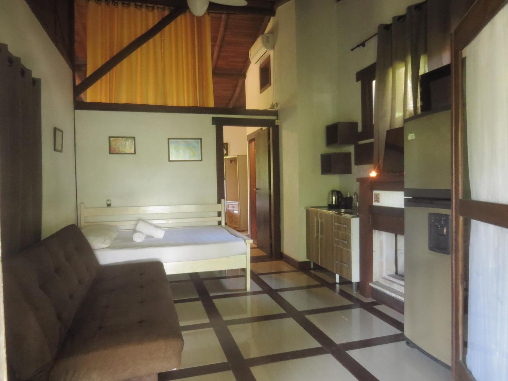 Pousada Aloha Beach House برايا دو روزا الغرفة الصورة